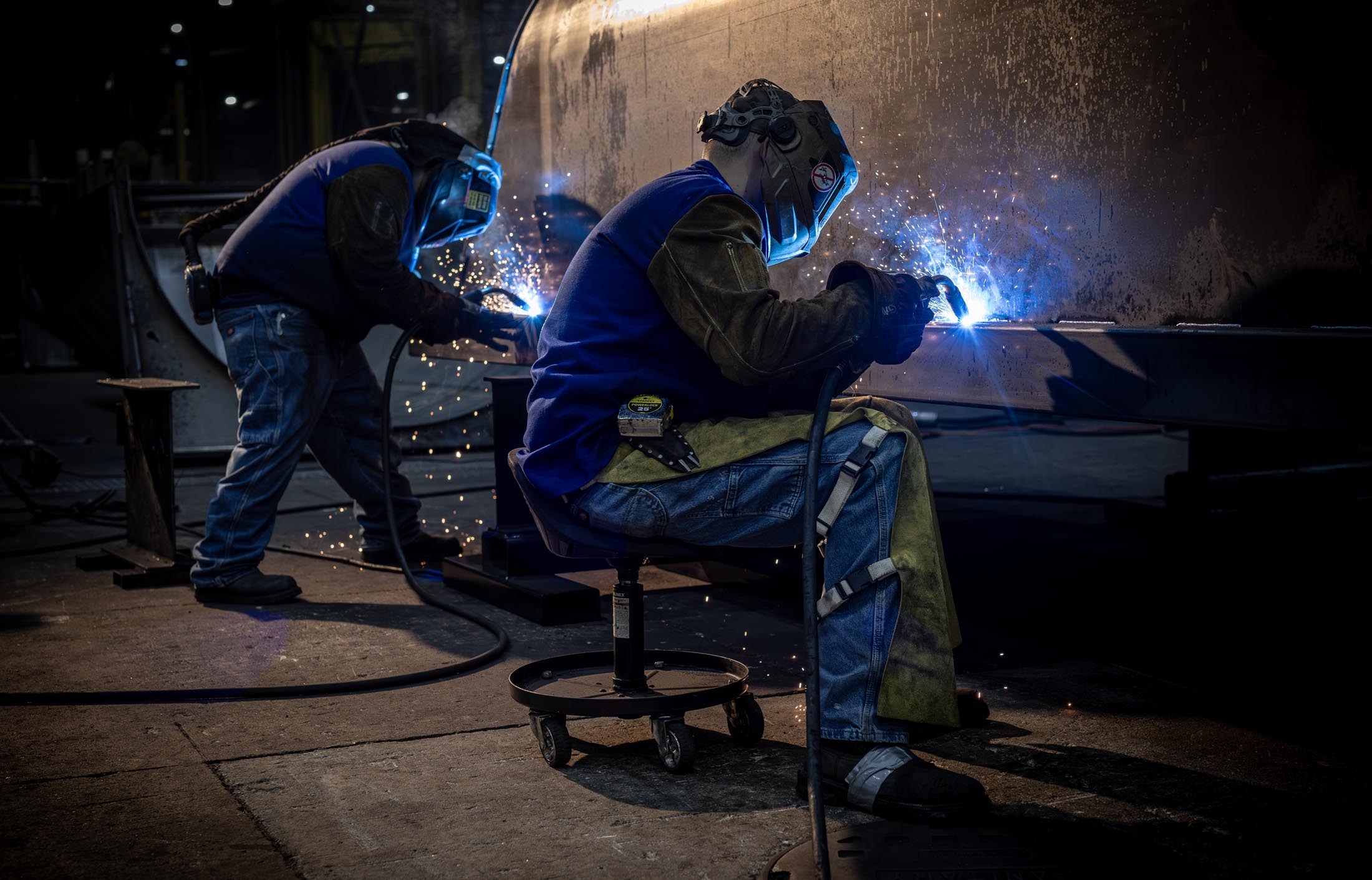 Welders manufacturing a MTM Trailer