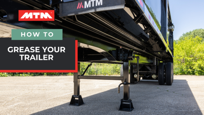 The underbelly of a full-frame end-dump trailer with text reading: how to grease your trailer