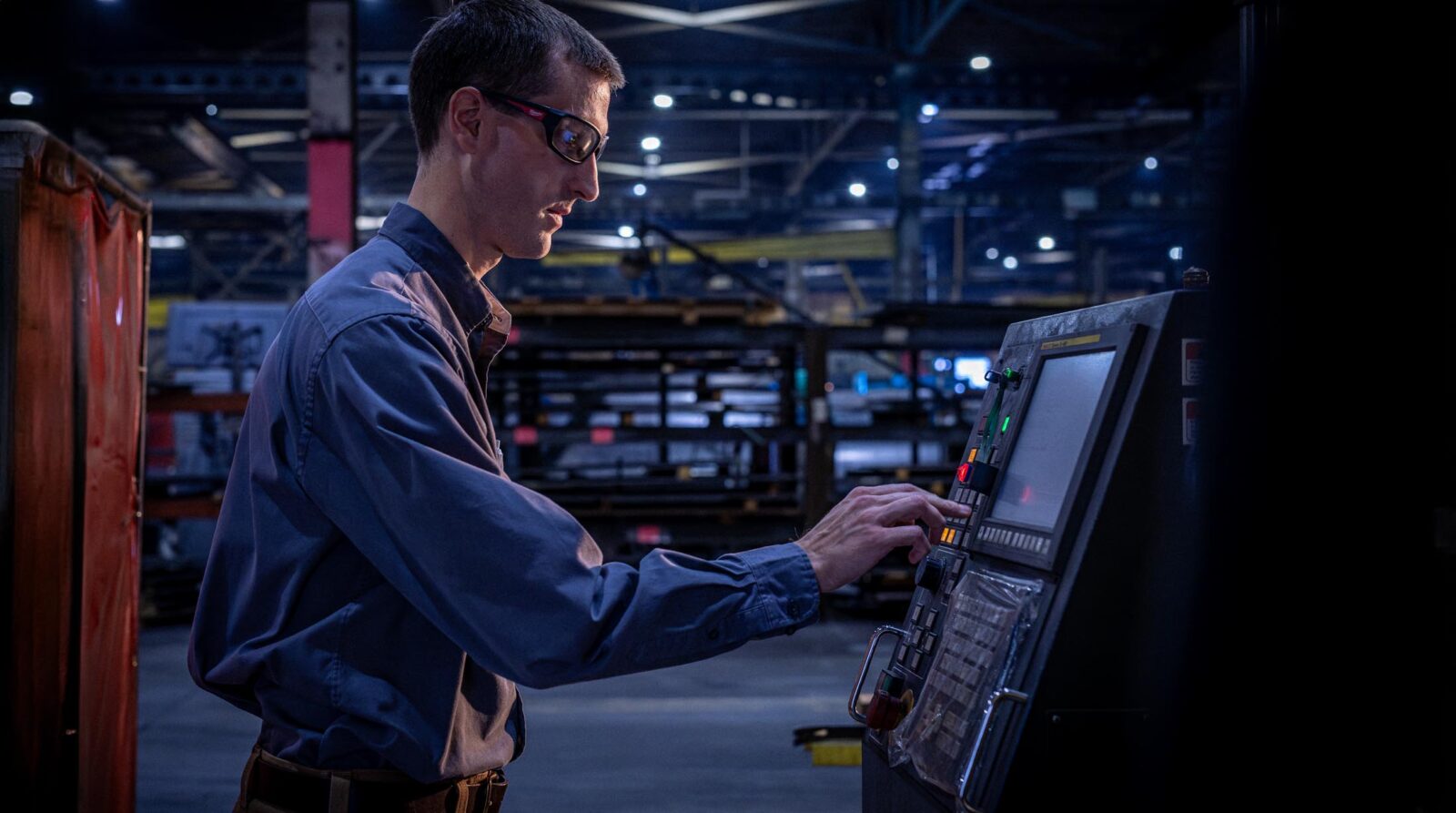 Man working on a machine at MTM trailers