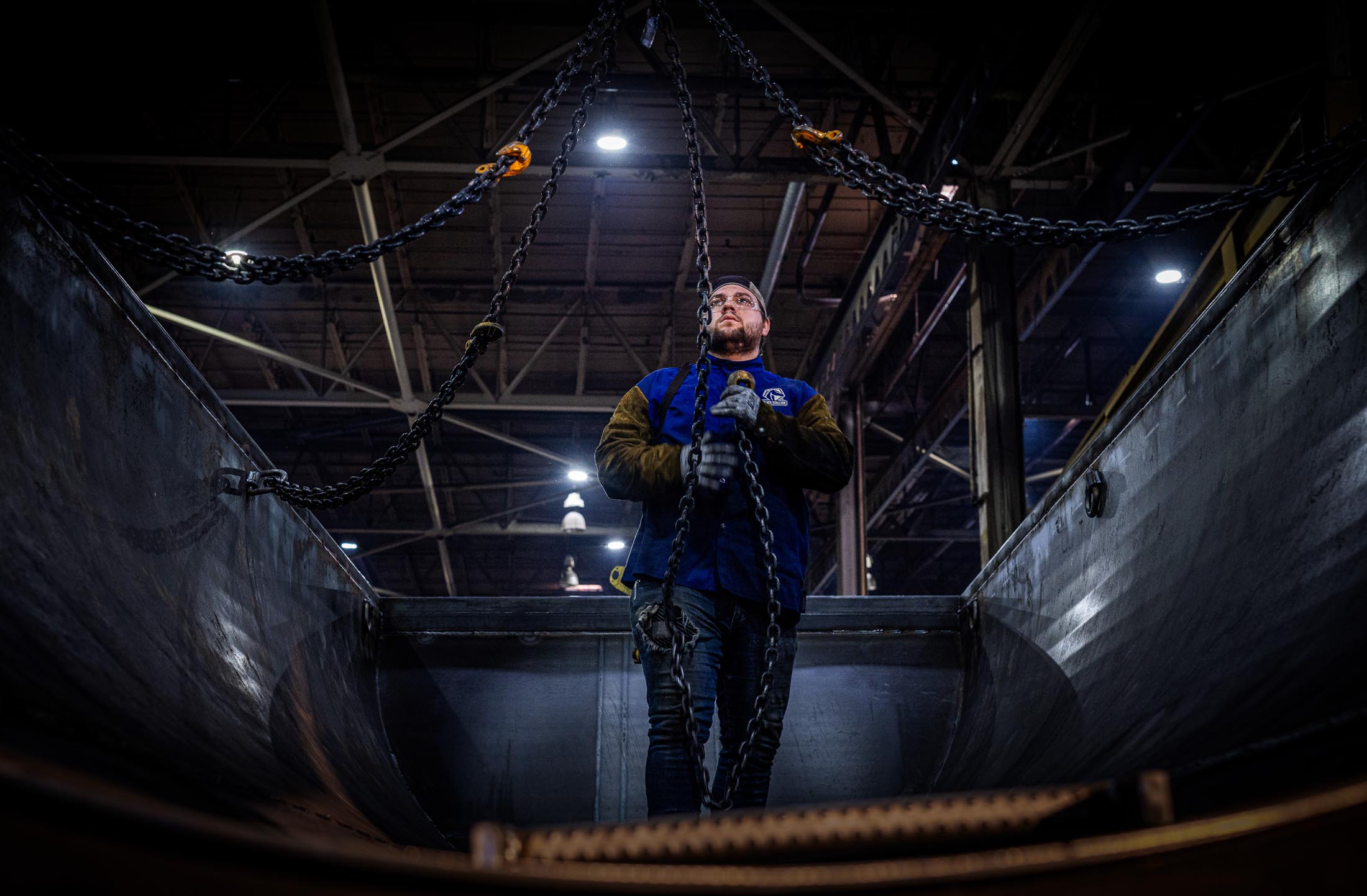 MTM employee working on a trailer in the MTM manufacturing facility