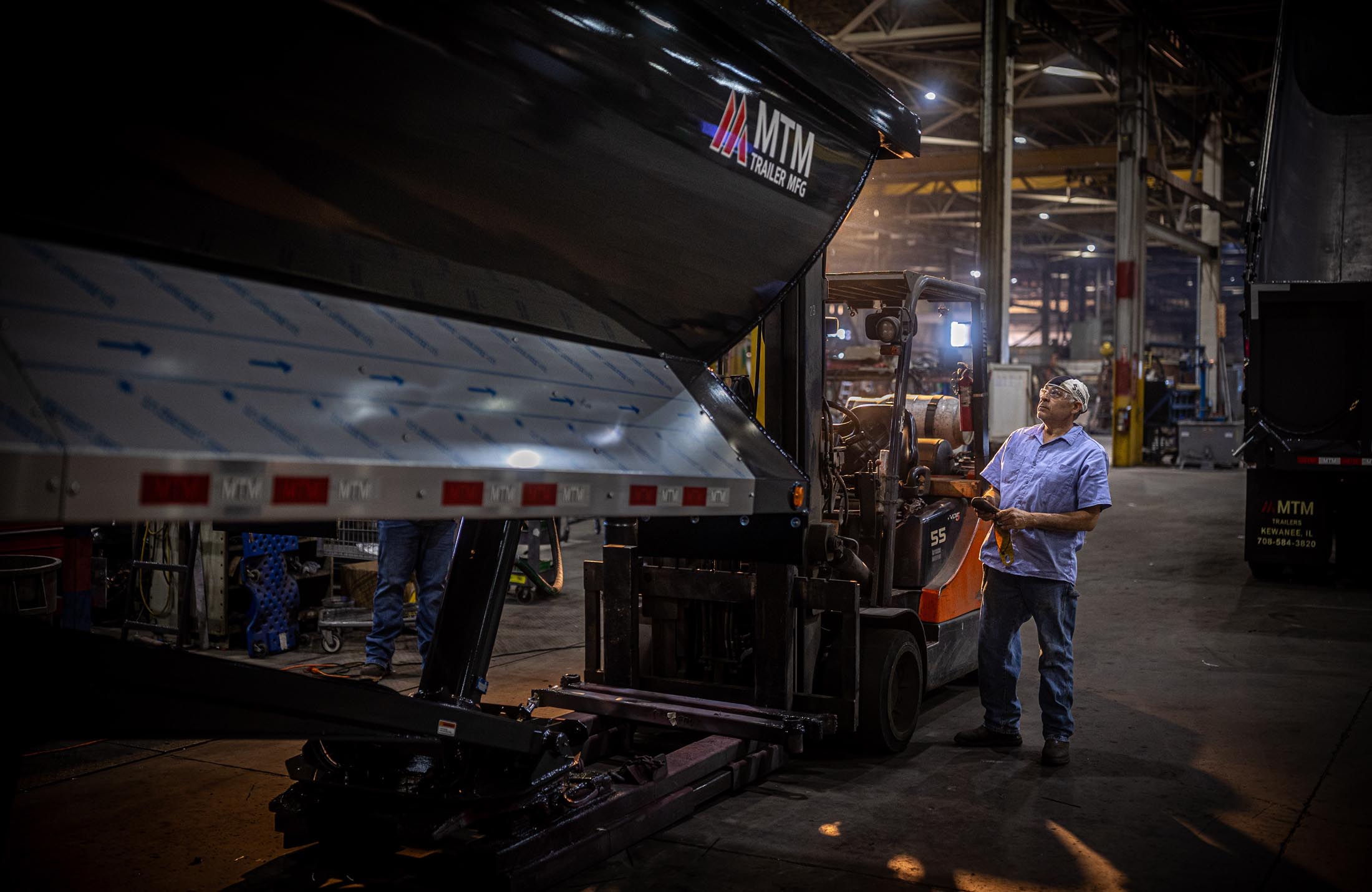 MTM employee testing a trailer coming off the assembly line