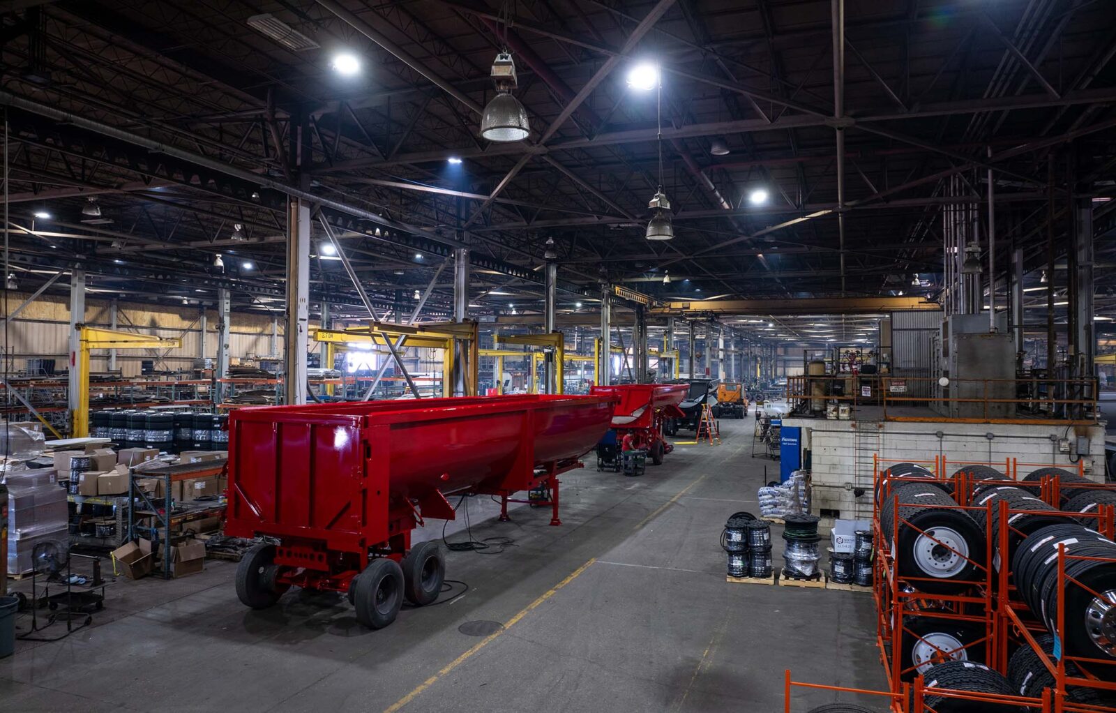 red scrap trailer being built in the mtm factory