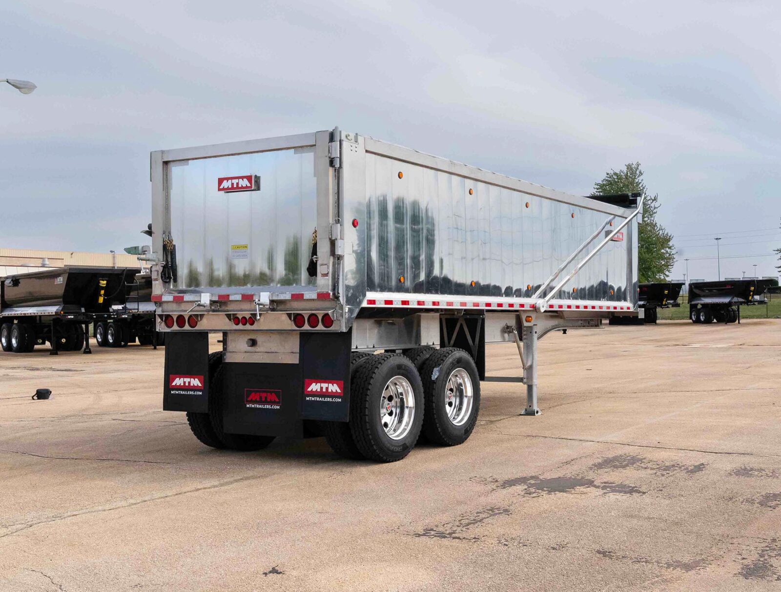Rear view of an MTM Aluminum Full Frame end-dump trailer