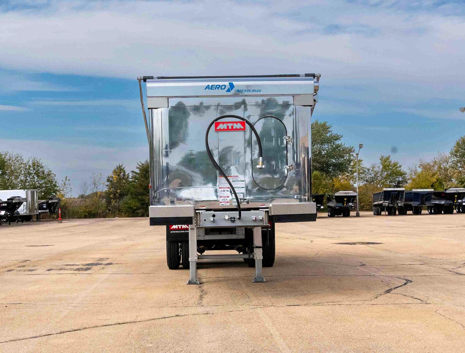 Front view of an MTM Aluminum Full Frame end-dump trailer