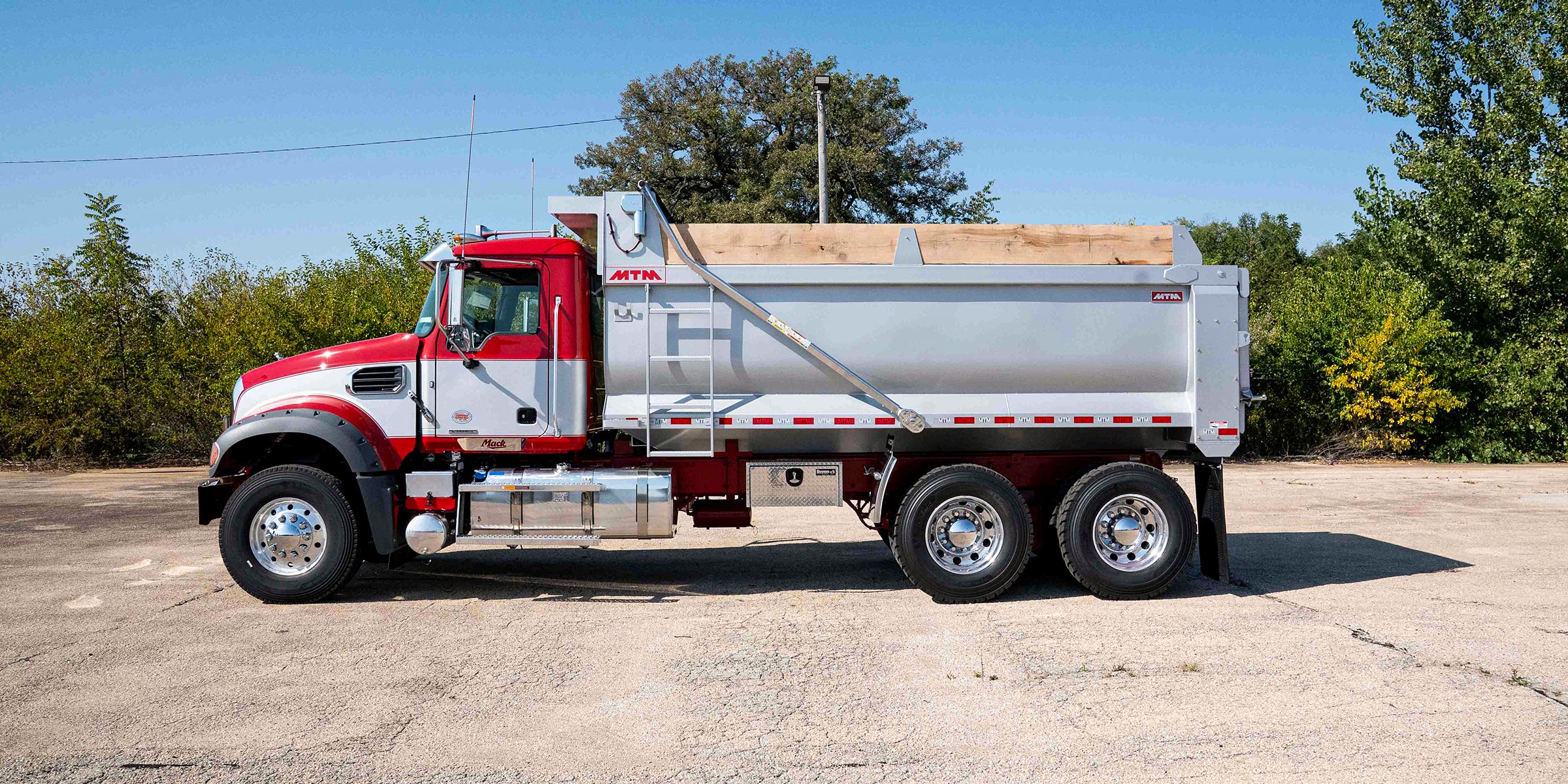 Side view of a truck with a new MTM Dump Body