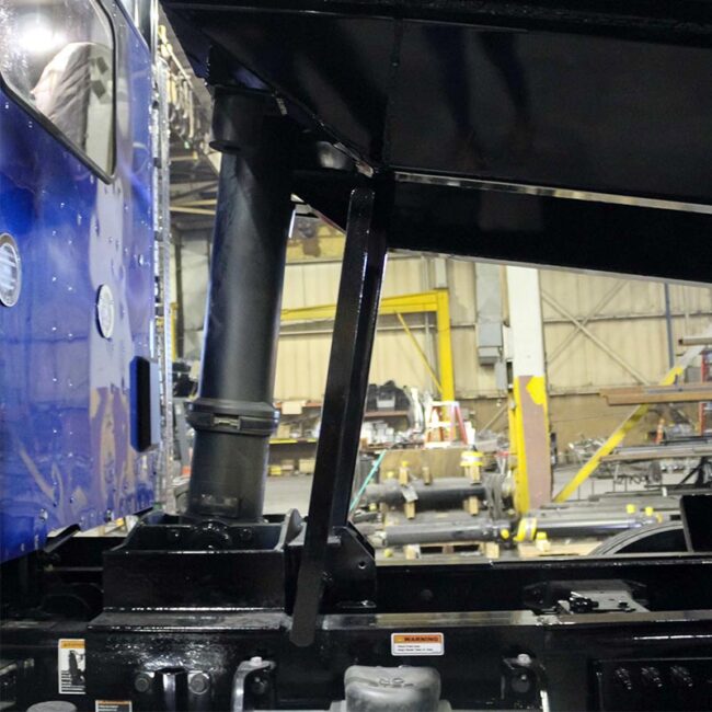 Detail of MTM Body Lock on a dump body