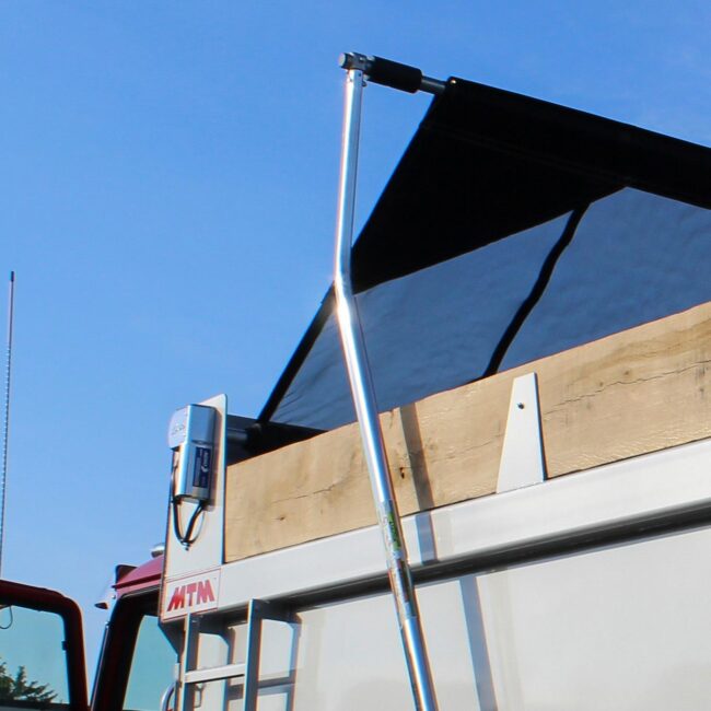 Detail of integrated tarp system equipment on an MTM Dump Body